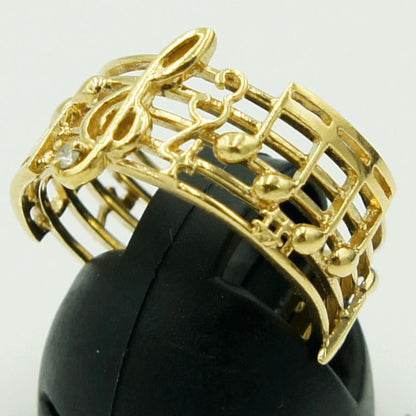 K18ダイヤモンドリング「音符」　D0.02ct　リングサイズ15号　重量5.70ｇ(石の重量含む)（中古）