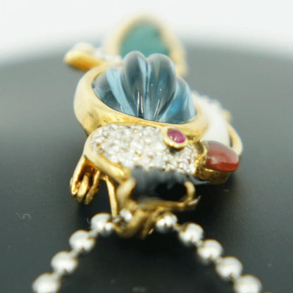 K18マルチ石付ブローチ　オニキス・メノウ・トパーズ「鳥 オウム」　重量6.33ｇ(石の重量込み）（中古）