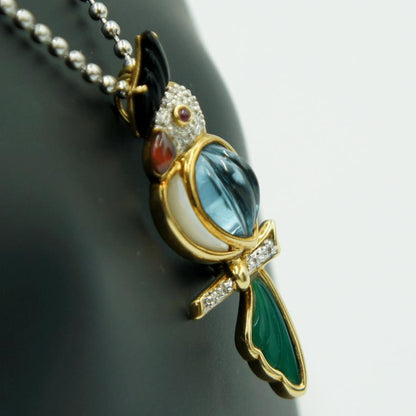 K18マルチ石付ブローチ　オニキス・メノウ・トパーズ「鳥 オウム」　重量6.33ｇ(石の重量込み）（中古）