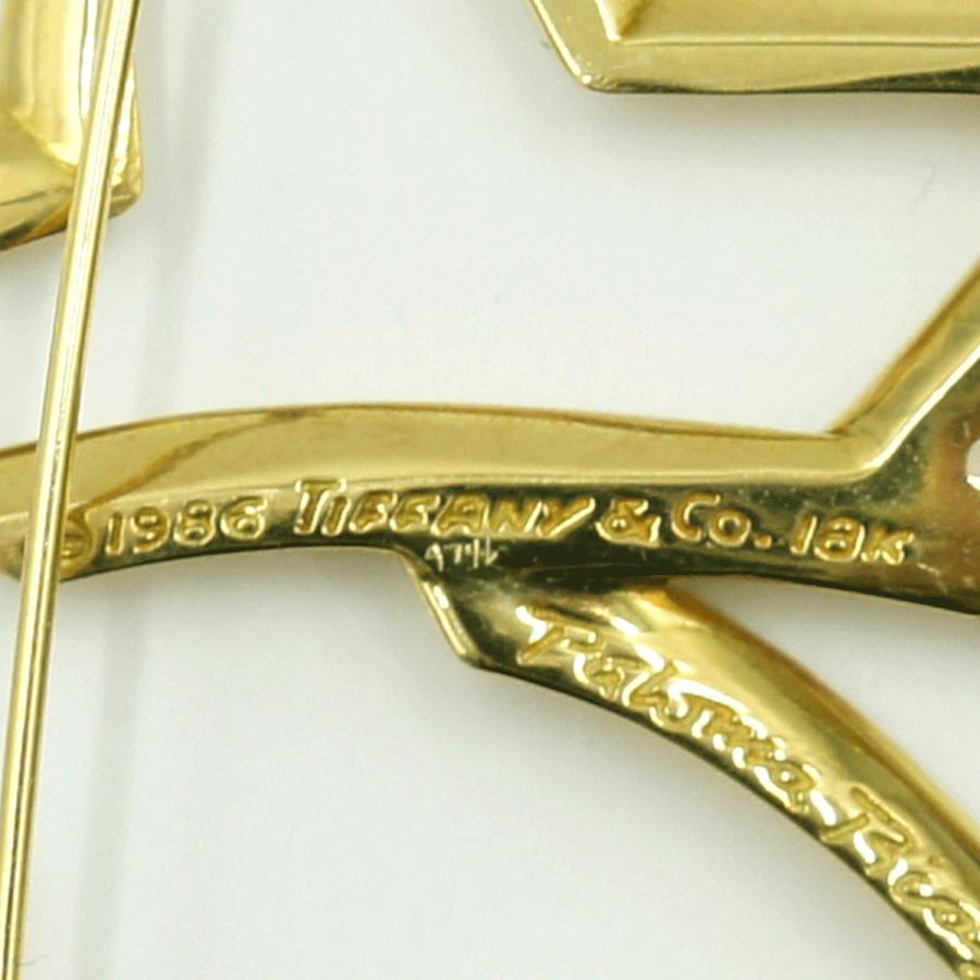 ティファニー(Tiffany & Co.)　750 星型ブローチ　重量16.27ｇ　レディース（中古）