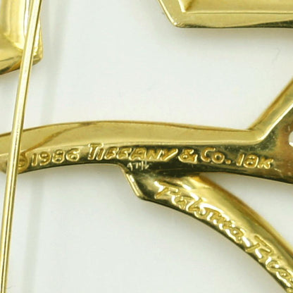 ティファニー(Tiffany & Co.)　750 星型ブローチ　重量16.27ｇ　レディース（中古）