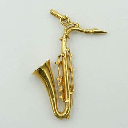 K18デザインペンダントトップ　「サックス」　重量7.07ｇ　楽器モチーフ　レディース（中古）