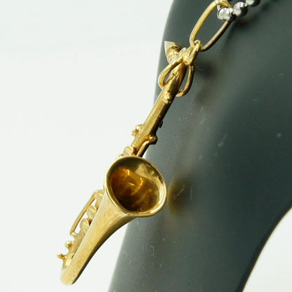 K18デザインペンダントトップ　「サックス」　重量7.07ｇ　楽器モチーフ　レディース（中古）