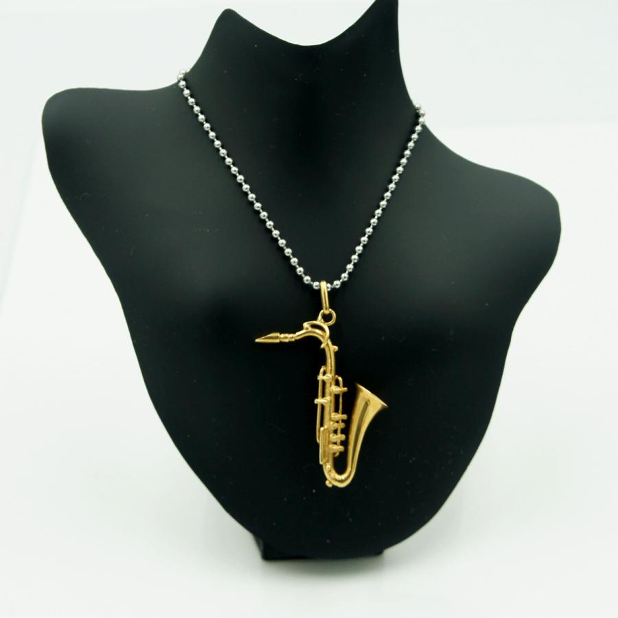 K18デザインペンダントトップ　「サックス」　重量7.07ｇ　楽器モチーフ　レディース（中古）