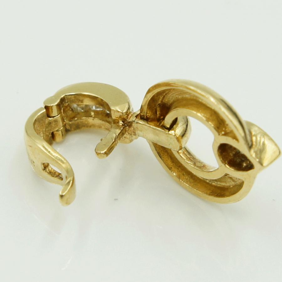 K18ダイヤモンドペンダントトップ　(メイン石)D0.16ct　合計D0.25ct　重量4.49ｇ(石の重量含む)（中古）