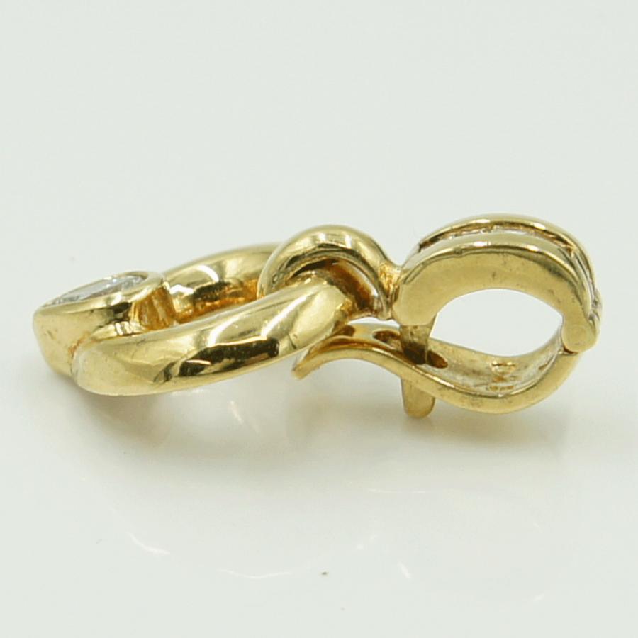 K18ダイヤモンドペンダントトップ　(メイン石)D0.16ct　合計D0.25ct　重量4.49ｇ(石の重量含む)（中古）