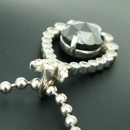 K18WGブラックダイヤペンダントトップ　BD1.74ct　D0.34ct　重量3.57ｇ(石の重量含む)（中古）